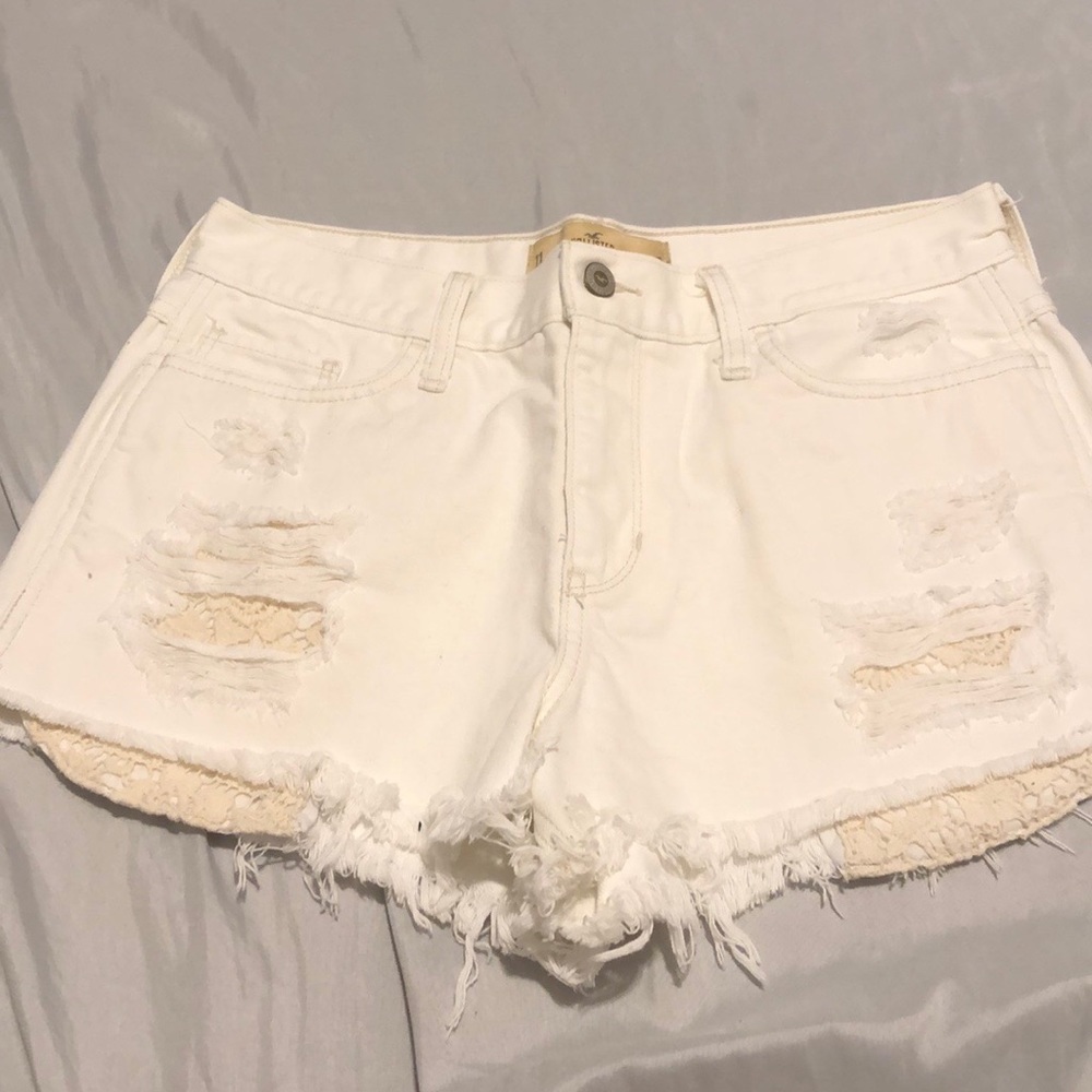 Distressed white hollister shorts